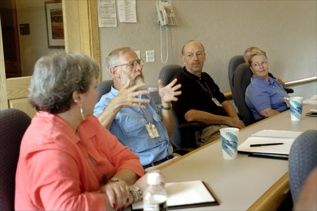 A group discussing around a table